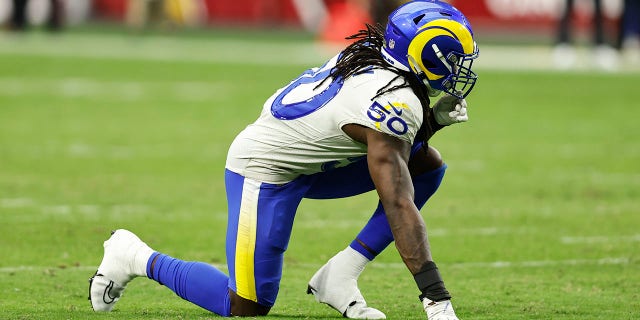 Takkarist McKinley #50 of the Los Angeles Rams lines up during an NFL football game between the Arizona Cardinals and the Los Angeles Rams at State Farm Stadium on September 25, 2022 in Glendale, Arizona.