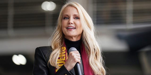 Tanya Snyder, Washington Commanders co-owner and co-CEO, speaks before an NFL football game between the Washington Commanders and the Green Bay Packers, Sunday, Oct. 23, 2022, in Landover, Maryland. 