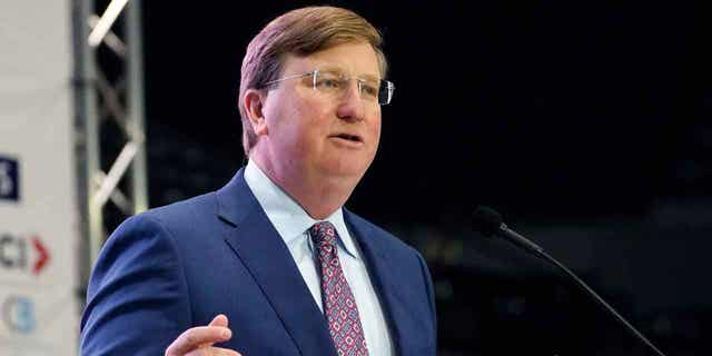 Mississippi Gov. Tate Reeves addresses business leaders at the Mississippi Economic Council's annual "Hobnob Mississippi" in Jackson, Miss., Thursday, Oct. 27, 2022. Reeves expressed a desire for the elimination of the state's income tax during his address. (AP Photo/Rogelio V. Solis)