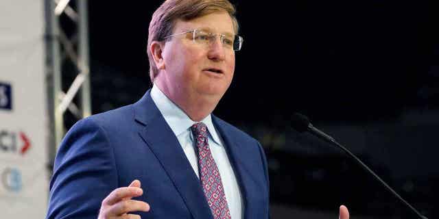 Mississippi Gov. Tate Reeves addresses business leaders at the Mississippi Economic Council's annual "Hobnob Mississippi" in Jackson, Miss., Thursday, Oct. 27, 2022. Reeves expressed a desire for the elimination of the state's income tax during his address. (AP Photo/Rogelio V. Solis)