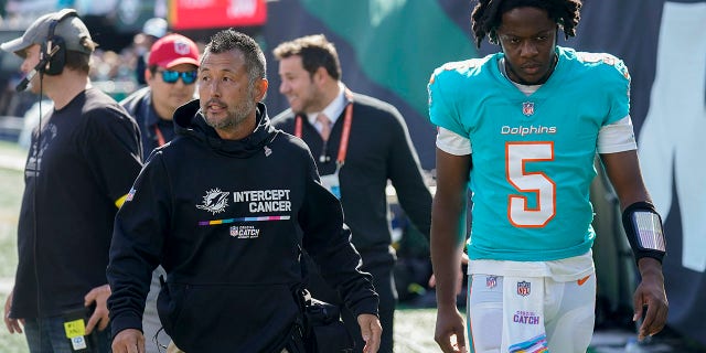 Miami Dolphins quarterback Teddy Bridgewater leaves the field after taking a hit from the New York Jets, Sunday, Oct. 9, 2022.