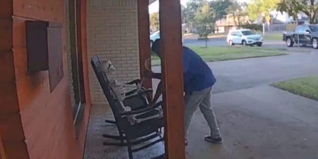 A middle-aged man was caught on camera stealing both a skeleton decoration and a rocking chair.