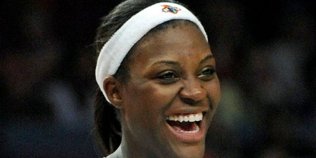New York Liberty forward Tiffany Jackson smiles during the fourth quarter as the Liberty beat the Phoenix Mercury 105-72 in a WNBA basketball game Sunday, June 22, 2008 at Madison Square Garden in New York.