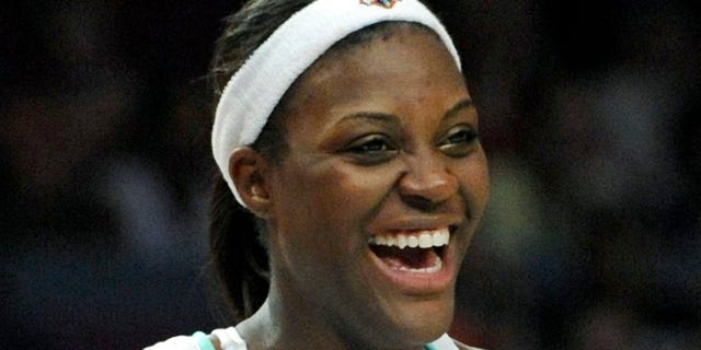 New York Liberty forward Tiffany Jackson smiles during the fourth quarter as the Liberty beat the Phoenix Mercury 105-72 in a WNBA basketball game Sunday, June 22, 2008 at Madison Square Garden in New York.