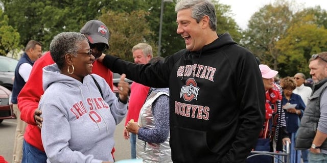 Rep. Tim Ryan speaks with voters at a tailgate party at The Ohio State University football game, on Oct. 1, 2022, in Columbus