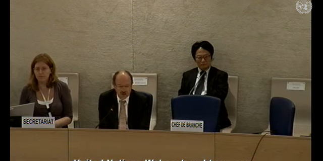 United Nations Human Rights Council President Eric Tistonay sits next to Emma Riley on September 21, 2012. 