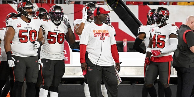 Tampa Bay Buccaneers head coach Todd Bowles wears Florida Strong tee-shirt during the first half of an NFL football game against the Kansas City Chiefs Sunday, Oct. 2, 2022 in Tampa, Florida. 