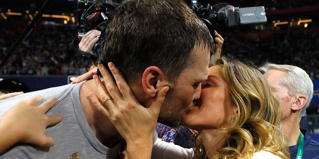 Tom Brady #12 of the New England Patriots kisses his wife Gisele Bündchen after the Super Bowl LIII against the Los Angeles Rams at Mercedes-Benz Stadium on Feb. 3, 2019 in Atlanta, Georgia.