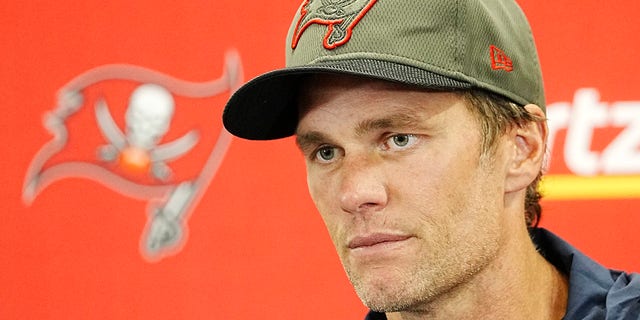 Tampa Bay Buccaneers quarterback Tom Brady, #12, talks to the media after his teams 21-3 loss to the Carolina Panthers after an NFL football game Sunday, Oct. 23, 2022, in Charlotte, North Carolina.