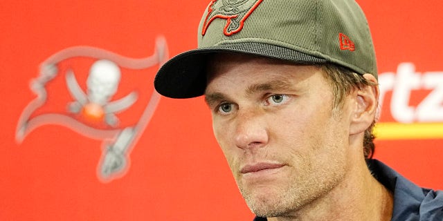 Tampa Bay Buccaneers quarterback Tom Brady (12) talks to the media after his teams 21-3 loss to the Carolina Panthers after an NFL football game Sunday, Oct. 23, 2022, in Charlotte, N.C. 