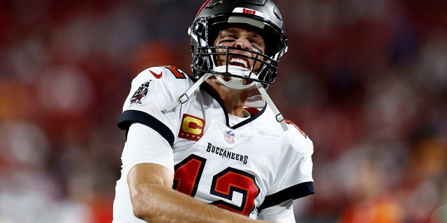 Tom Brady cheers on the crowd