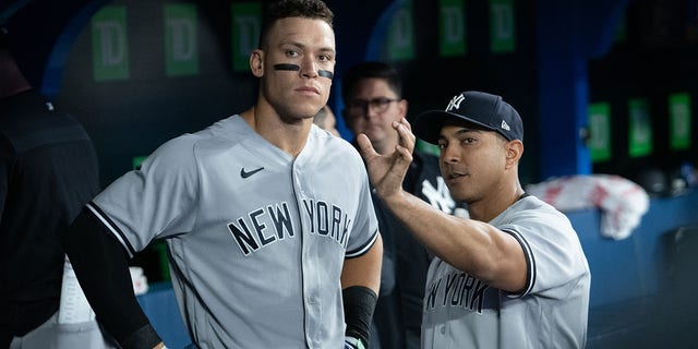 New York Yankees outfielder Aaron Judge (99) reacts in the dugout before the MLB baseball regular season game between the New York Yankees and the Toronto Blue Jays on Sept. 26, 2022, at Rogers Centre in Toronto, ON, Canada.