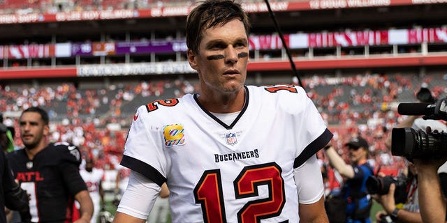 Tampa Bay Buccaneers quarterback Tom Brady, #12, walks off the field after the game against the Atlanta Falcons at Raymond James Stadium in Tampa, Florida, Oct. 9, 2022.