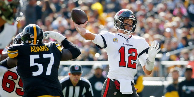 Tom Brady of the Tampa Bay Buccaneers throws the ball against the Pittsburgh Steelers at Acrisure Stadium on Oct. 16, 2022, in Pittsburgh.