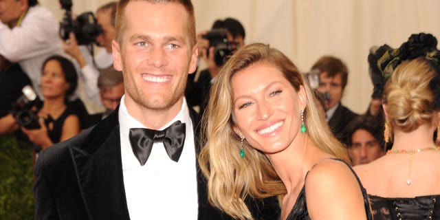 Tom Brady and Gisele smile for a photo