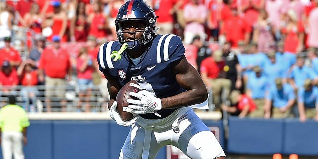 Michael Trigg of the Mississippi Rebels carries the ball during a game against the Tulsa Golden Hurricane at Vaught-Hemingway Stadium Sept. 24, 2022, in Oxford, Miss.