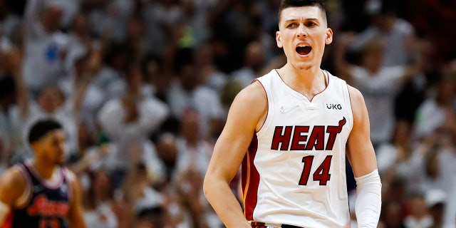 May 2, 2022; Miami, Florida, USA; Miami Heat guard Tyler Herro (14) reacts after scoring in the third quarter against the Philadelphia 76ers during game one of the second round for the 2022 NBA playoffs at FTX Arena.