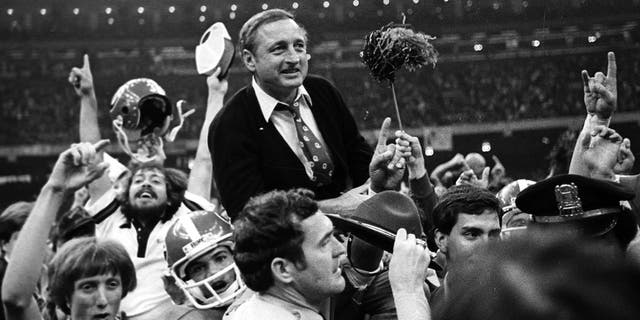 Georgia football coach Vince Dooley is carried off the field after Georgia defeated Notre Dame 17-10 in the Sugar Bowl Jan. 1, 1981, in New Orleans. 