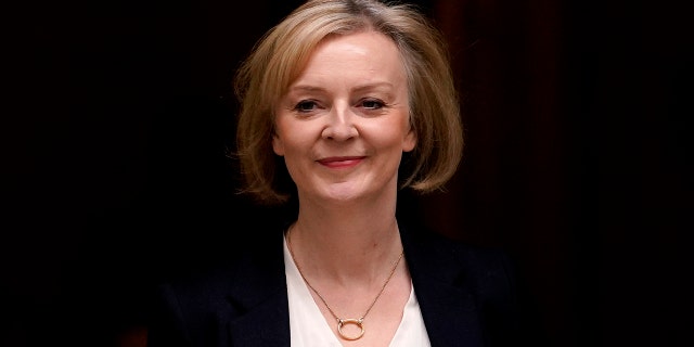 British Prime Minister Liz Truss leaves 10 Downing Street to attend a session of Parliament in London on Wednesday 19 October 2022.