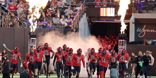 UNLV Rebels take the field for a game against the Air Force Falcons at Allegiant Stadium on October 15, 2022, in Las Vegas, Nevada.