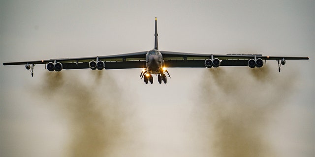 A United States Air Force B-52 bomber lands at RAF Fairford in the United Kingdom during Russian forces formation near the Ukrainian border on 10 February 2022. 