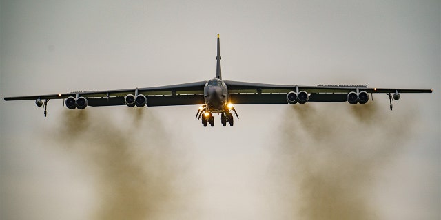 A United States Air Force B-52 bomber lands at RAF Fairford in the United Kingdom during Russian forces formation near the Ukrainian border on 10 February 2022. 