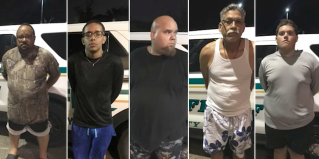 Five men are being charged with two counts of burglary during a state of emergency and two counts of grand theft of a fire extinguisher.