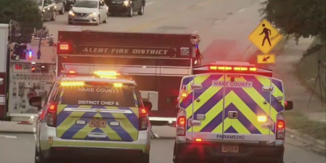 Emergency response vehicles in an east Raleigh neighborhood.