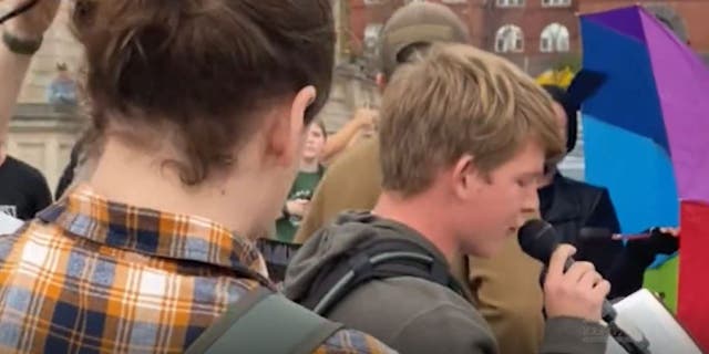 Leftist protesters harassed a man reading the Bible outside a conservative speaking event in Wisconsin