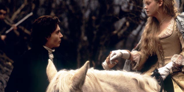 American actors Johnny Depp and Christina Ricci on the set of "Sleepy Hollow," based on the story by Washington Irving, directed by Tim Burton.