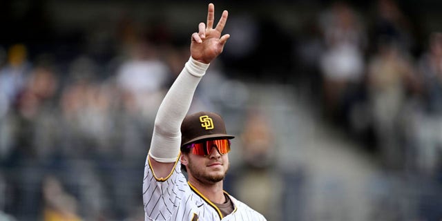 Wil Myers of the San Diego Padres acknowledges the crowd as he leaves the game during the eighth inning against the San Francisco Giants Oct. 5, 2022, at Petco Park in San Diego.