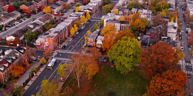 Aerial shot of Wilmington, Delaware, at sunrise on an autumn morning.