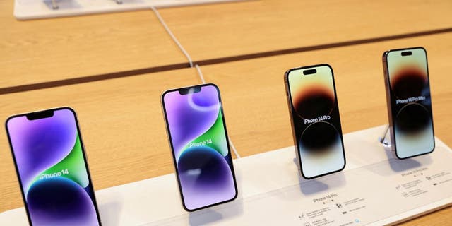 The iPhone 14, iPhone 14 Pro, and iPhone 14 Pro Max are on display at the Apple Store on Fifth Avenue in New York City on September 16, 2022. 