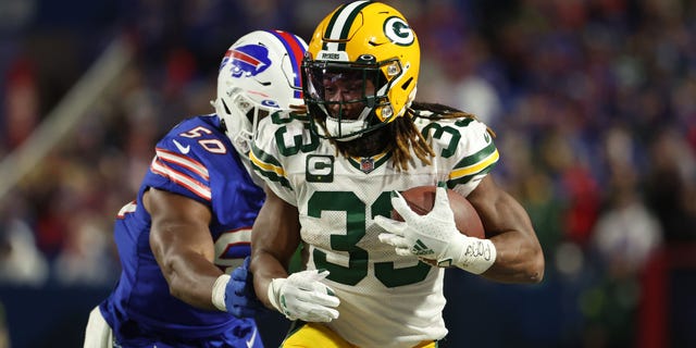 No. 33 Aaron Jones of the Green Bay Packers plays in the third quarter against the Buffalo Bills at Highmark Stadium on October 30, 2022 in Orchard Park, New York.