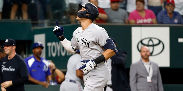 Aaron Judge of the New York Yankees reacts after hitting his 62nd home run of the season against the Texas Rangers during the first inning in game two of a doubleheader at Globe Life Field Oct. 4, 2022, in Arlington, Texas.
