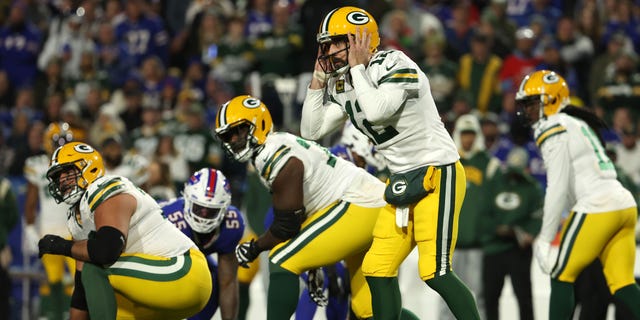 Aaron Rodgers #12 of the Green Bay Packers prepares to take a snap during the third quarter against the Buffalo Bills at Highmark Stadium on October 30, 2022, in Orchard Park, New York.