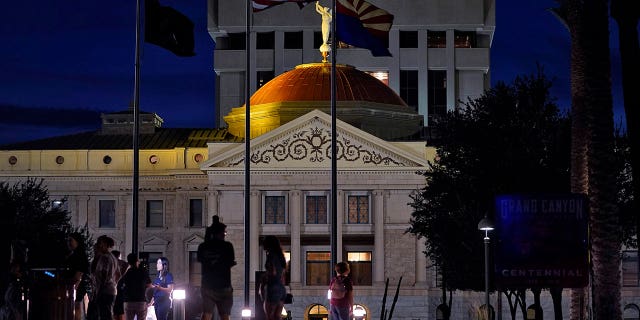 Protesters outside the Capitol voice their dissent with an abortion ruling in Phoenix, Arizona, on Sept. 23, 2022.
