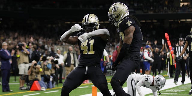 Alvin Kamara (41) of the New Orleans Saints celebrates a touchdown in the third quarter against the Las Vegas Raiders on October 30, 2022 in New Orleans.