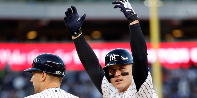 Anthony Rizzo of the New York Yankees reacts after hitting an RBI single against the Cleveland Guardians during the fifth inning in Game 5 of an American League Division Series at Yankee Stadium Oct. 18, 2022, in New York, N.Y.