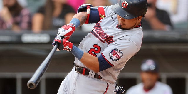 Luis Arraez, #2 of the Minnesota Twins, hits a double against the Chicago White Sox during the third inning at Guaranteed Rate Field on Oct. 5, 2022 in Chicago.