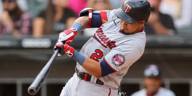 Luis Arraez, #2 of the Minnesota Twins, hits a double against the Chicago White Sox during the third inning at Guaranteed Rate Field on Oct. 5, 2022 in Chicago.