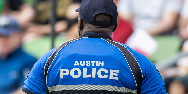 AUSTIN, TX - JULY 29: A member of the Austin, Texas police department stands watch during the Gold Cup semifinal match between the United States and Qatar on Thursday July 29th, 2021 at Q2 stadium in Austin,TX. 