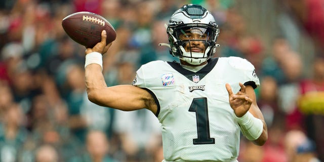 Jalen Hurts of the Philadelphia Eagles drops back to pass against the Arizona Cardinals at State Farm Stadium Oct. 9, 2022, in Glendale, Ariz.