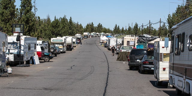 A "safe parking" zone was established on a side street for the growing homeless population in Bend, Oregon.