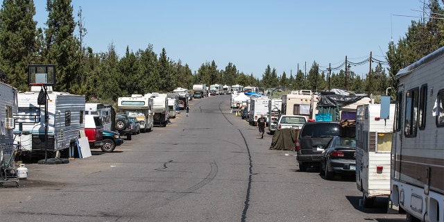 A "safe parking" zone was established on a side street for the growing homeless population in Bend, Oregon.