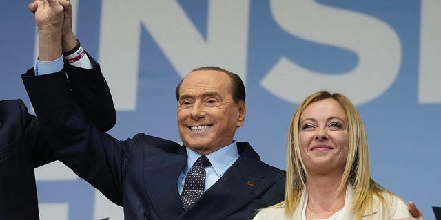 Forza Italia's Silvio Berlusconi, and Brothers of Italy's Giorgia Meloni attend the center-right coalition closing rally in Rome Thursday, Sept. 22, 2022.