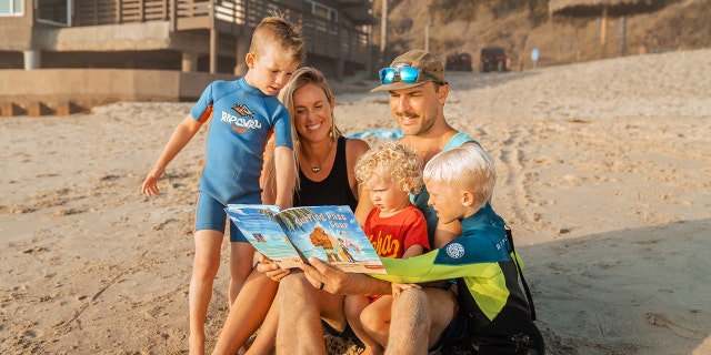 Bethany Hamilton surrounded by her family — her husband Adam and their three boys — near their home in Hawaii.