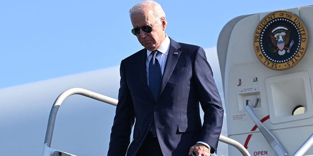 US President Joe Biden steps off Air Force One upon arrival at Philadelphia International Airport in Philadelphia on October 7, 2022.