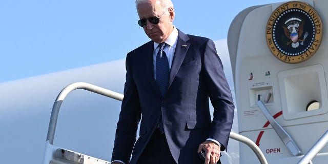 US President Joe Biden steps off Air Force One upon arrival at Philadelphia International Airport in Philadelphia on October 7, 2022.