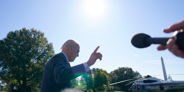 President Biden walks past reporters before boarding Marine One on the South Lawn of the White House in Washington, D.C., on Thursday. (AP Photo/Evan Vucci)